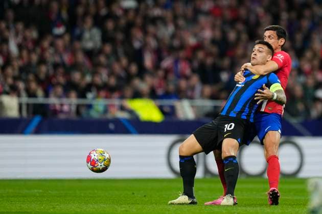 Atletico Madrid v FC Internazionale: Round of 16 Second Leg - UEFA Champions League 2023 24 Lautaro Martinez Centre-Forward of Inter and Argentina and Stefan Savic centre-back of Atletico de Madrid and Montenegro compete for the ball during the UEFA Champions League 2023 24 round of 16 second leg match between FC Barcelona, Barca and SSC Napoli at Estadi Olimpic Lluis Companys on March 12, 2024 in Barcelona, Spain. Madrid Spain  Copyright: xJosexBretonx originalFilename:breton-atletico240313_npMh5.jpg