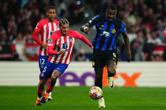 Marcus Thuram of Inter Milan and Rodrigo de Paul of Atletico de Madrid Atletico de Madrid v Inter Milan. UEFA Champions League match. Round of 16.. Football, Civitas Metropolitano Stadium, Barcelona, Spain - 13 March 2024 Editorial use only  Copyright: xBaguxBlanco PRESSINPHOTO Shutterstockx 14388164m