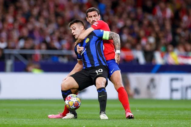 Lautaro Martinez (FC Internazionale) and Stefan Savic (Atletico de Madrid) battle for the ball, UEFA Champions League 2023 2024 - Round of 16 second leg, Atletico Madrid vs FC Internazionale, CIvitas Metropolitano Stadium, March 13, 2024, Madrid, Spain.