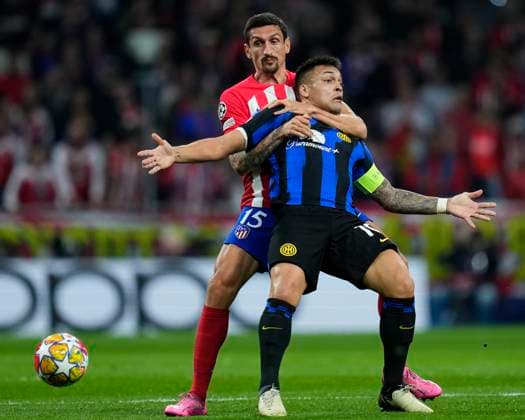 Atletico de Madrid and FC INternazionale Stefan Savic of Atletico de Madrid and Lautaro Martinez of FC Internazionaleduring the UEFA Champions League match, Round of 16, second leg, between Atletico de Madrid and FC INternazionale played at Camp Civitas Metropolitano Stadium on March 13, 2024 in Madrid Spain. Madrid SPAIN EDITORIAL USE ONLY Copyright: xx Senisx xCebollax 0420479780st