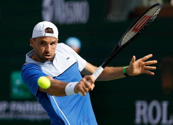 March 13, 2024 Grigor Dimitrov of Bulgaria returns a shot against Daniil Medvedev of Russia during the BNP Paribas Open in Indian Wells, CA. CSM Indian Wells United States of America - ZUMAc04_ 20240313_zma_c04_178 Copyright: xCharlesxBausx