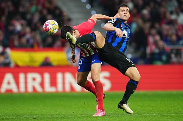 Sport Bilder des Tages ESP: Atletico de Madrid v Inter Milan. UEFA Champions League match. Round of 16. Stefan Savic of Atletico de Madrid and Lautaro Martinez of Inter Milan during the UEFA Champions League match, Round of 16, second leg, between Atletico de Madrid and Inter Milan played at Civitas Metropolitano Stadium on March 13, 2024 in Madrid Spain. kpng Copyright: xBaguxBlancox xPRESSINPHOTOx PS_240313_1766