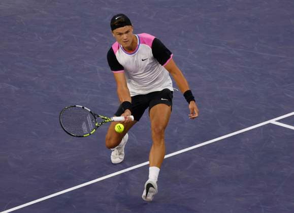 Tennis 2024: BNP Paribas Open MAR 13 March 13, 2024 Holger Rune of Denmark returns a shot against Taylor Fritz during the BNP Paribas Open in Indian Wells, CA. Charles Baus CSM (Credit Image: Â Charles Baus Cal Media) Indian Wells Ca United States of America EDITORIAL USE ONLY Copyright: xx ZUMA-20240313_zma_c04_203.jpg CharlesxBausx csmphotothree241878
