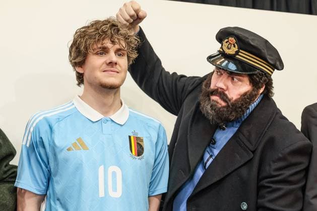 A man dressed as cartoon character Captain Haddock (R) pretends to hit one of the models showing the home and away outfits, during a press conference, PK, Pressekonferenz of Belgian national soccer team Red Devils to present the new shirts for the UEFA EURO, EM, Europameisterschaft,Fussball 2024 European Championship, EM, Europameisterschaft Thursday 14 March 2024, at the Musee Herge in Louvain-la-Neuve. The new outfit, with light blue shirt with white collar, combined with brown shorts, refers to the iconic outfit of Kuifje - Tintin, the world-famous Belgian reporter-adventurer from the Herge comic books. BRUNOxFAHY  x89126420x