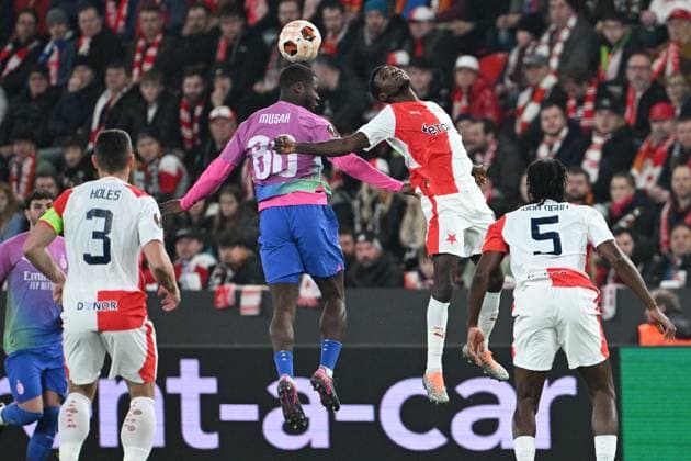 (L-R) Tomas Holes of Slavia, Muhamed Tijani of AC Milan, Muhamed Tijani and Igoh Ogbu of Slavia in action during the Slavia Praha vs AC Milan football return match of the Europa League semi-final on March 14, 2024, Prague, Czech Republic. (CTKxPhoto MichalxKamaryt) CTKPhotoP2024031407287  CTKPhotoP2024031407287