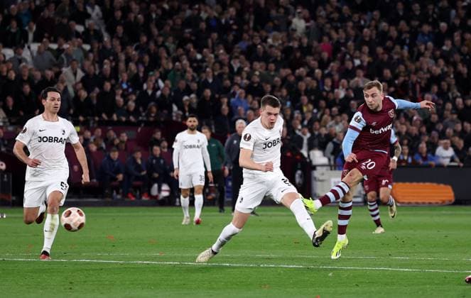 London, England, 14th March 2024. West Ham United s Jarrod Bowen scoring his sides second goal during the UEFA Europa League Round of 16 match at the London Stadium, London. Picture credit should read: David Klein Sportimage EDITORIAL USE ONLY. No use with unauthorised audio, video, data, fixture lists, club league logos or live services. Online in-match use limited to 120 images, no video emulation. No use in betting, games or single club league player publications. SPI-3008-0023