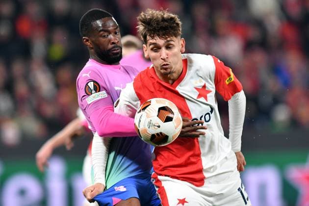 March 14, 2024, Prague, Czech Republic: MOJMIR CHYTIL of Slavia Praha (R) fight for ball with Milan s FIKAYO TOMORI (L) at Eden Stadion during Round of 16, 2st leg, of the UEFA Europa League, at March 14, 2024, in Prague in the Czech Republic. Prague Czech Republic - ZUMAr156 20240314_aap_r156_003 Copyright: xSlavekxRutax