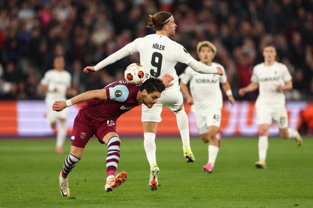14th March 2024; London Stadium, London, England; Europa League Football, Round of 16, Second Leg, West Ham United versus SC Freiburg; Konstantinous Mavropanos of West Ham United competes for the ball with Lucas Holer of SC Freiburg  ActionPlus12617896 ShaunxBrooks