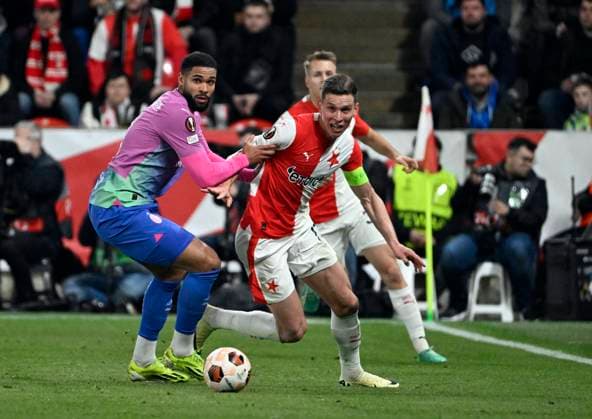 Ruben Loftus-Cheek of AC Milan, left, and Lukas Provod of Slavia Praha in action during the Slavia Praha vs AC Milan football return match of the Europa League semi-final on March 14, 2024, Prague, Czech Republic. (CTKxPhoto KaterinaxSulova) CTKPhotoP2024031407756  CTKPhotoP2024031407756