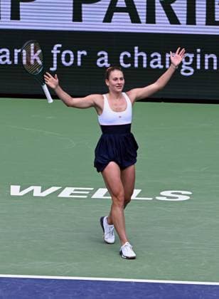 INDIAN WELLS, CA - MARCH 14: Marta Kostyuk (UKR) drops her racket after winning a WTA, Tennis Damen quarterfinals tennis match played on March 14, 2024 during the BNP Paribas Open played at the Indian Wells Tennis Garden in Indian Wells, CA. (Photo by John Cordes Icon Sportswire) TENNIS: MAR 14 BNP Paribas Open EDITORIAL USE ONLY Icon506240314002