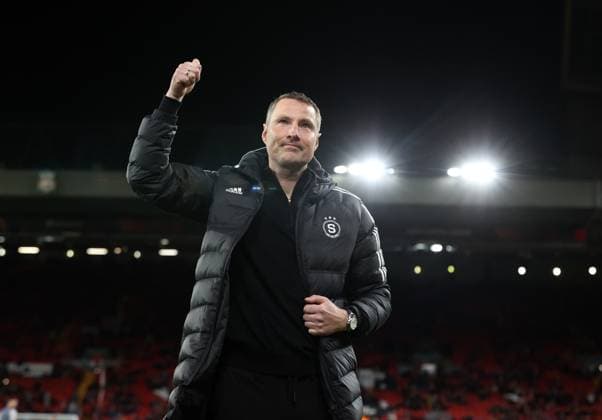 14th March 2024; Anfield, Liverpool, Merseyside, England; Europa League, Round of 16, Second Leg Football, Liverpool versus Sparta Prague; Sparta Prague manager Brian Priske waves to the visiting supporters  ActionPlus12617926 DavidxBlunsden