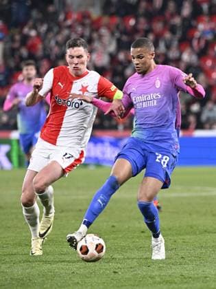 Lukas Provod of Slavia Praha, left, and Malick Thiaw of AC Milan in action during the Slavia Praha vs AC Milan football return match of the Europa League semi-final on March 14, 2024, Prague, Czech Republic. (CTKxPhoto KaterinaxSulova) CTKPhotoP2024031408139  CTKPhotoP2024031408139