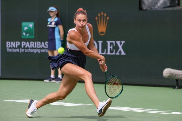 INDIAN WELLS, CA - MARCH 14: Marta Kostyuk (UKR) hits a backhand during the BNP Paribas Open on March 14, 2024 at Indian Wells Tennis Garden in Indian Wells, CA. (Photo by George Walker Icon Sportswire) TENNIS: MAR 14 BNP Paribas Open EDITORIAL USE ONLY Icon240314017