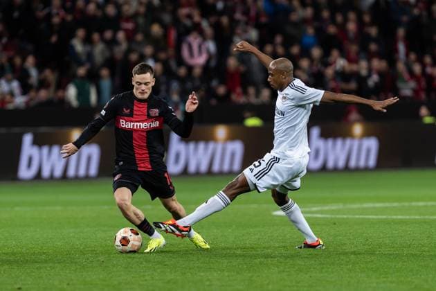 GER, UEFA Europa League Bayer 04 Leverkusen vs QarabaÄü AÄüdam Qarabag Agdam 14 03 2024, BayArena, Leverkusen, GER, UEFA Europa League Bayer 04 Leverkusen vs QarabaÄü AÄüdam Qarabag Agdam In the picture duel between Florian Wirtz Bayer 04 Leverkusen, 10 Julio Romao Ramao QarabaÄü AÄüdam Qarabag Agdam, 6 nordphotoxGmbHxx xChristianxSchulze nph000300