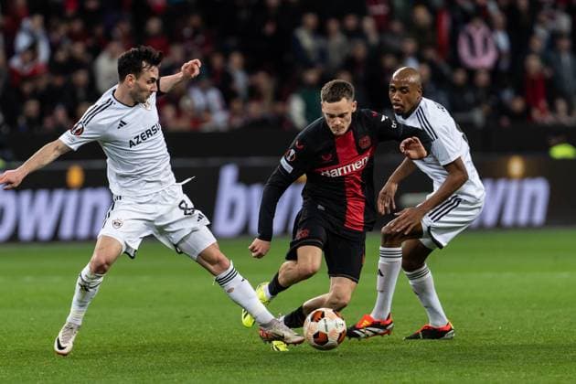 GER, UEFA Europa League Bayer 04 Leverkusen vs QarabaÄü AÄüdam Qarabag Agdam 14 03 2024, BayArena, Leverkusen, GER, UEFA Europa League Bayer 04 Leverkusen vs QarabaÄü AÄüdam Qarabag Agdam In the picture duel between Florian Wirtz Bayer 04 Leverkusen, 10 Julio Romao Ramao QarabaÄü AÄüdam Qarabag Agdam, 6 Marko Jankovic QarabaÄü AÄüdam Qarabag Agdam, 8 nordphotoxGmbHxx xChristianxSchulze nph000300