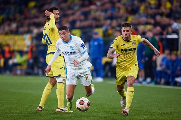 March 14, 2024: Amine Harit (C) of Olympique de Marseille competes for the ball with Dani Parejo (L) of Villarreal and Kiko Femenia of Villarreal (R) during the UEFA Europa League, Round of 16, football match played between Villarreal CF and Olympique de Marseille at Estadio de la Ceramica on March 14, 2024, in Villarreal, Spain. - ZUMAa181 20240314_zaa_a181_032 Copyright: xDavidxAliagax