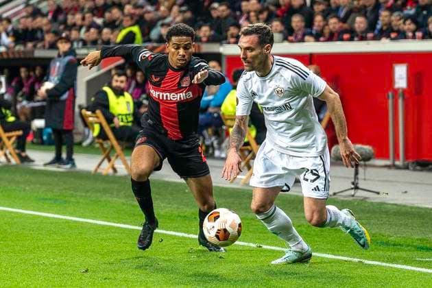 One-on-one fight between Amine Adli Bayer 04 Leverkusen, 21 and Marko Vesovic Qarabag Agdam, 29 Football UEFA Europa League, Season 2023 2024, Round of 16, Second leg, Bayer 04 Leverkusen Qarabag FK on 14 03 2024 at BayArena in Leverkusen Photo Kirchner Media TH Copyright: xKirchner-Media THx