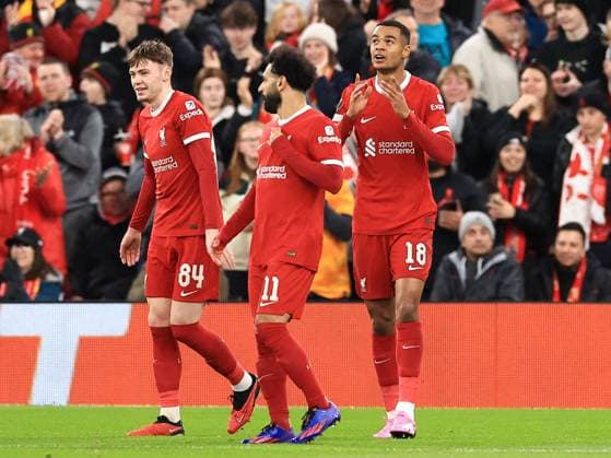 Liverpool FC v AC Sparta Prague Cody Gakpo of Liverpool scores his sides fourth goal of the match and reacts as he celebrates with team mates during the Liverpool FC v AC Sparta Prague Last 16, 2nd Leg UEFA Europa League match at Anfield, Liverpool, England, United Kingdom on 14 March 2024 Editorial use only. All images are copyright Every Second Media Limited. No images may be reproduced without prior permission. Copyright: xIMAGO EveryxSecondxMediax ESM-0951-0050