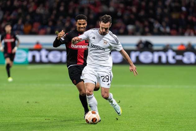 GER, UEFA Europa League Bayer 04 Leverkusen vs QarabaÄü AÄüdam Qarabag Agdam 14 03 2024, BayArena, Leverkusen, GER, UEFA Europa League Bayer 04 Leverkusen vs QarabaÄü AÄüdam Qarabag Agdam In the picture duel between Marko Vesovic QarabaÄü AÄüdam Qarabag Agdam, 29 Amine Adli Bayer 04 Leverkusen, 21 nordphotoxGmbHxx xChristianxSchulze nph000300