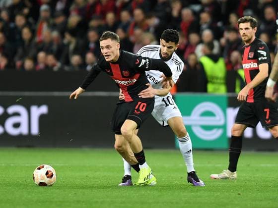 14 03 2024, Leverkusen, Germany, BayARENA, Bayer Leverkusen vs Qarabag FK UEFA Europa League 2023 2024 Round of 16 second leg, Florian Wirtz Bayer 04 Leverkusen and Abdellah Zoubir Qarabag Agdam in a duel Photo Ralf Treese Leverkusen BayARENA North Rhine Westphalia Germany 521_LEVQUA202403134_004 Treese-521