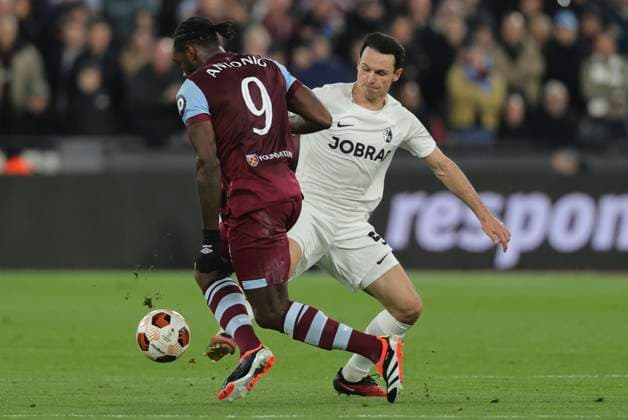 West Ham United v SC Freiburg UEFA Europa League Nicolas Hofler of SC Freiburg and Michail Antonio of West Ham United in action during the UEFA Europa League Round of 16 Second Leg match at the London Stadium, Stratford Copyright: xPaulxChestertonx FIL-19832-0196 UK Newspapers OUT