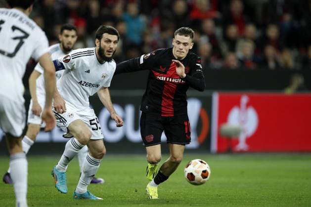 LEVERKUSEN - (l-r) Badavi Huseynov of FK Qarabag, Florian Wirtz of Bayer 04 Leverkusen during the UEFA Europa league round of 16 match between Bayer 04 Leverkusen and FK Qarabag at De Bay Arena on March 14, 2024 in Leverkusen, Germany. ANP Hollandse Hoogte Bart Stoutjesdijk UEFA Europa League 2023 24 2023 2024 xVIxANPxSportx xBartxStoutjesdijkxIVx 493699504 originalFilename: 493699504.jpg