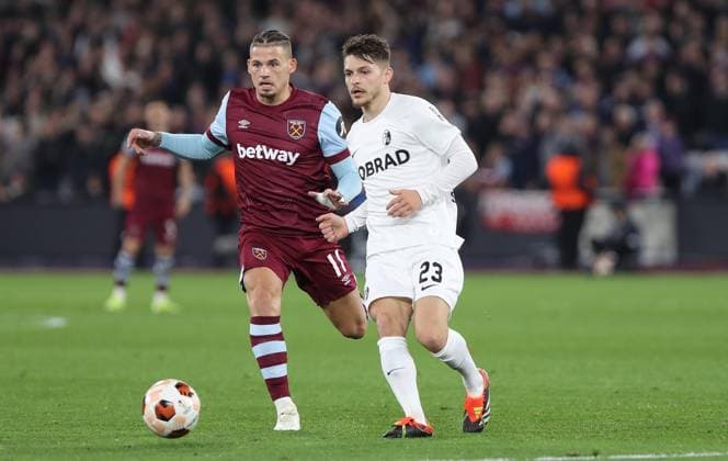 . - West Ham United v SC Freiburg, UEFA Europa League, Round Of 16, 2nd Leg, London Stadium, London, UK - 14th March 2024. Florent Muslija of SC Freiburg battles Kalvin Phillips of West Ham United. - West Ham United v SC Freiburg, UEFA Europa League, Round Of 16, 2nd Leg, London Stadium, London, UK - 14th March 2024. London London Stadium UK Copyright: xDanxWeirx CP_West_Ham_SC_Freiburg_21