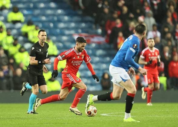 Rangers v Benfica UEFA Europa League Rafa of Benfica (middle) drives forward during the UEFA Europa League Round of 16 Second Leg match at Ibrox Stadium, Glasgow Copyright: xFredxPalmerx FIL-19834-0113 UK Newspapers OUT