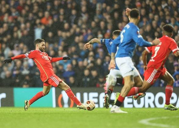 Rangers v Benfica UEFA Europa League Rafa of Benfica (left) drives forward during the UEFA Europa League Round of 16 Second Leg match at Ibrox Stadium, Glasgow Copyright: xFredxPalmerx FIL-19834-0114 UK Newspapers OUT