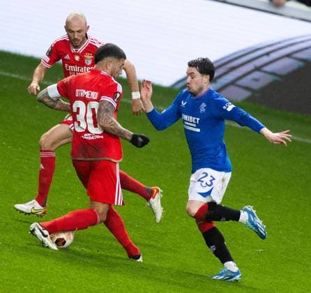 Nicolas Otamendi of Benfica stops Scott Wright of Rangers during the Europa League match at Ibrox Stadium, Glasgow. Rangers v Benfica, UEFA Europa League, Round of 16, Second Leg, Football, Ibrox Stadium, Glasgow, UK - 14 Mar 2024 EDITORIAL USE ONLY No use with unauthorised audio, video, data, fixture lists, club league logos or live services. Online in-match use limited to 120 images, no video emulation. No use in betting, games or single club league player publications. Copyright: xKirkxO Rourke RangersxFC Shutterstockx 14389044cc