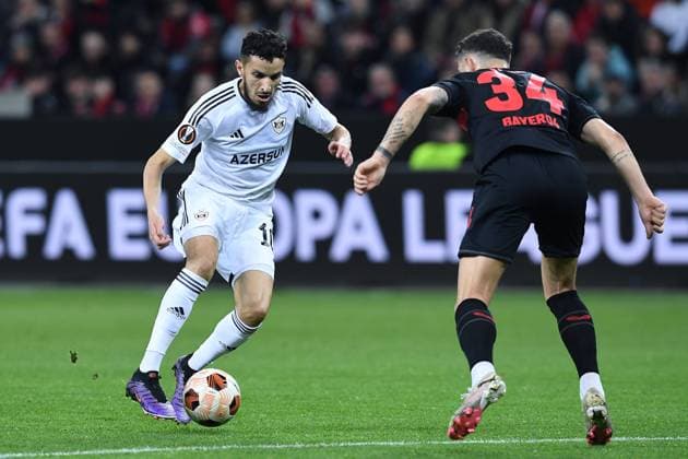 Soccer Europa League Round of 16 Bayer 04 Leverkusen Qarabag Agdam on 14 03 2024 at the BayArena in Leverkusen Abdellah Zoubir Agdam , left Granit Xhaka Leverkusen , right xRx