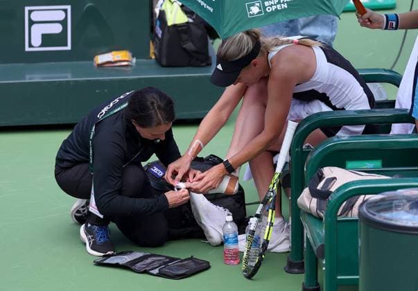 Caroline Wozniacki of Denmark receives medical treatment on her foot BNP Paribas Open, Tennis, Day 9, Indian Wells Tennis Garden, California, USA - 14 Mar 2024  Copyright: xEllaxLing Shutterstockx 14386185ay