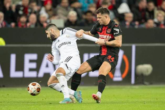 Duel between Yassine Benzia Qarabag Agdam, 07 and Granit Xhaka Bayer 04 Leverkusen, 34 Football UEFA Europa League, Season 2023 2024, Round of 16, Second leg, Bayer 04 Leverkusen Qarabag FK on 14 03 2024 at BayArena in Leverkusen Photo Kirchner Media TH Copyright: xKirchner-Media THx