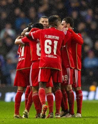 Rafa Silva of Benfica celebrates scoring his sides first goal during UEFA Europa League Round of 16 Second Leg match at Ibrox. Rangers v Benfica, UEFA Europa League, Round of 16, Second Leg, Football, Ibrox Stadium, Glasgow, UK - 14 Mar 2024 EDITORIAL USE ONLY No use with unauthorised audio, video, data, fixture lists, club league logos or live services. Online in-match use limited to 120 images, no video emulation. No use in betting, games or single club league player publications. Copyright: xLukexNickerson RangersxFC Shutterstockx 14389051cw