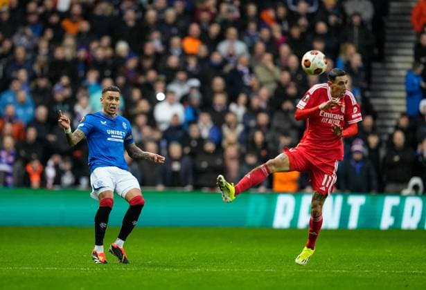 Rangers Captain James Tavernier passes the ball beyond Angel Di Maria of Benfica. Rangers v Benfica, UEFA Europa League, Round of 16, Second Leg, Football, Ibrox Stadium, Glasgow, UK - 14 Mar 2024 EDITORIAL USE ONLY No use with unauthorised audio, video, data, fixture lists, club league logos or live services. Online in-match use limited to 120 images, no video emulation. No use in betting, games or single club league player publications. Copyright: xStuartxWallace Shutterstockx 14385550z