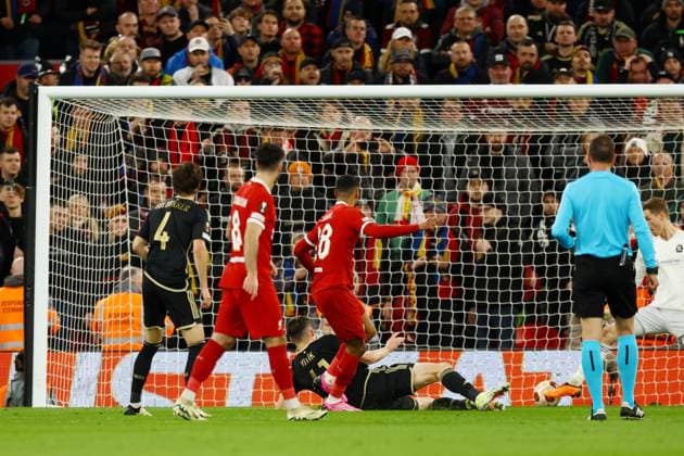 Liverpool, England, 14th March 2024. Cody Gakpo of Liverpool scores his teams forth goal of the game during the UEFA Europa League Round of 16 match at Anfield, Liverpool. Picture credit should read: Gary Oakley Sportimage EDITORIAL USE ONLY. No use with unauthorised audio, video, data, fixture lists, club league logos or live services. Online in-match use limited to 120 images, no video emulation. No use in betting, games or single club league player publications. SPI-3009-0013