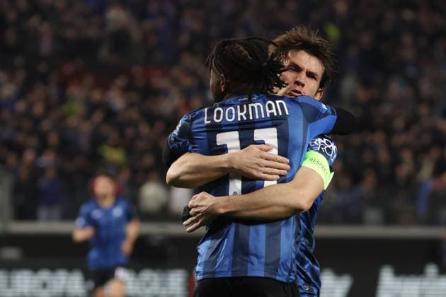 Bergamo, Italy, 14th March 2024. Ademola Lookman of Atalanta celebrates with team mate Marten De Roon after scoring to level the game at 1-1 during the UEFA Europa League match at Stadio di Bergamo. Picture credit should read: Jonathan Moscrop Sportimage EDITORIAL USE ONLY. No use with unauthorised audio, video, data, fixture lists, club league logos or live services. Online in-match use limited to 120 images, no video emulation. No use in betting, games or single club league player publications. SPI-2992-0009