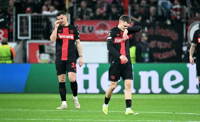 Football, Europa League, Germany, Men, Season 2023 2024, Round of 16 second leg, BayArena Leverkusen, Bayer Leverkusen Qarabag Agdam Frustration at Florian Wirtz LEV and Granit Xhaka LEV after the goal to 0 1 by Abdellah Zoubir QAR Disappointment, frustration, action UEFA REGULATIONS PROHIBIT ANY USE OF PHOTOGRAPHS AS IMAGE SEQUENCES AND OR QUASI VIDEO