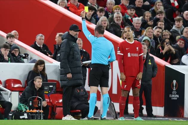 Liverpool FC v AC Sparta Praha: Round of 16 Second Leg - UEFA Europa League 2023 24 Jurgen Klopp, Manager of Liverpool is shown a Yellow card by Referee Artur Dias while trying to bring on Virgil van Dijk of Liverpool during the UEFA Europa League 2023 24 round of 16 second leg match between Liverpool FC and AC Sparta Praha at Anfield on March 14, 2024 in Liverpool, England. Liverpool Anfield England United Kingdom Copyright: xSportsphoto Sportsphoto APLx 13969516