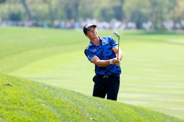 PONTE VEDRA BEACH, FL - MARCH 14: PGA, Golf Herren golfer Viktor Hovland hits a wedge shot on the 18th hole during The Players Championship on March 14, 2024, at TPC Sawgrass in Ponte Vedra Beach, Florida. (Photo by Brian Spurlock Icon Sportswire) GOLF: MAR 14 PGA THE PLAYERS Championship EDITORIAL USE ONLY Icon24031451