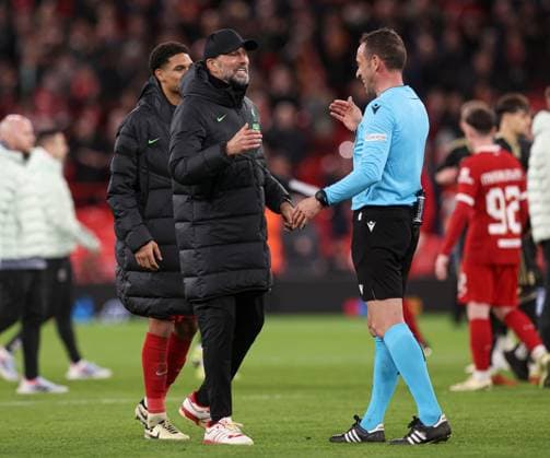 Liverpool manager Jurgen Klopp shares a joke with referee Artur Manuel Soares at the end of the match Liverpool v Sparta Prague, UEFA Europa League, Round of 16, Second Leg, Football, Anfield, Liverpool, UK - 14 Mar 2024 EDITORIAL USE ONLY No use with unauthorised audio, video, data, fixture lists, club league logos or live services. Online in-match use limited to 120 images, no video emulation. No use in betting, games or single club league player publications.  Copyright: xPaulxCurrie Shutterstockx 14385501cu