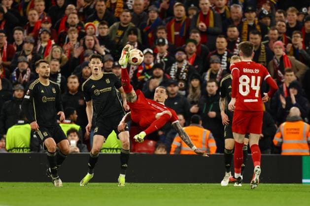 Liverpool, England, 14th March 2024. Darwin Nunez of Liverpool has a shot on goal during the UEFA Europa League Round of 16 match at Anfield, Liverpool. Picture credit should read: Gary Oakley Sportimage EDITORIAL USE ONLY. No use with unauthorised audio, video, data, fixture lists, club league logos or live services. Online in-match use limited to 120 images, no video emulation. No use in betting, games or single club league player publications. SPI-3009-0027