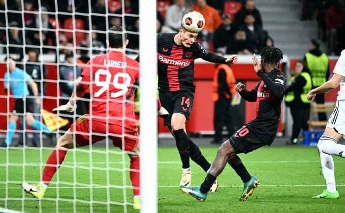 Football, Europa League, Germany, Men, Season 2023 2024, Round of 16 second leg, BayArena Leverkusen, Bayer Leverkusen Qarabag Agdam 3 2 Patrik Schick LEV scores the goal to make it 3 2 in injury time against Andrey Lunev QAR Action UEFA REGULATIONS PROHIBIT ANY USE OF PHOTOGRAPHS AS IMAGE SEQUENCES AND OR QUASI VIDEO