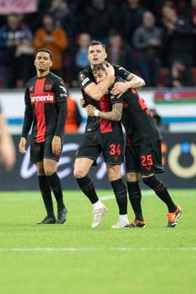 Granit Xhaka Bayer 04 Leverkusen, 34 and Exequiel Palacios Bayer 04 Leverkusen, 25 are beaming with joy in each others arms Behind them Amine Adli Bayer 04 Leverkusen, 21 Football UEFA Europa League, 2023 2024 season, round of 16, second leg, Bayer 04 Leverkusen Qarabag FK on 14 03 2024 at BayArena in Leverkusen Photo Kirchner Media TH Copyright: xKirchner-Media THx