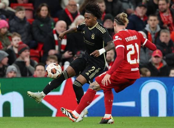 14th March 2024; Anfield, Liverpool, Merseyside, England; Europa League, Round of 16, Second Leg Football, Liverpool versus Sparta Prague; Angelo Preciado of Sparta Prague takes on Kostas Tsimikas of Liverpool  ActionPlus12618028 DavidxBlunsden