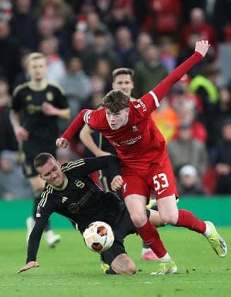 14th March 2024; Anfield, Liverpool, Merseyside, England; Europa League, Round of 16, Second Leg Football, Liverpool versus Sparta Prague; James McConnell of Liverpool evades a tackle from Lukas Haraslin of Sparta Prague  ActionPlus12618040 DavidxBlunsden
