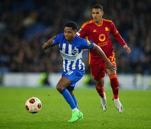 Brighton and Hove Albion v AS Roma, Brighton, UK - 14 Mar 2024 Ansu Fati of Brighton us pressured by Joao Costa of AS Roma during the Europa League match between Brighton and Hove Albion and AS Roma at The Amex Stadium, Brighton on 14 March 2024 ( Brighton The Amex Stadium Brighton England Copyright: xMicahxCrook PPAUKx PPA-098335