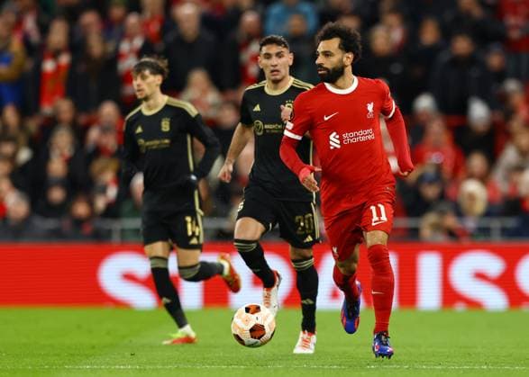 Liverpool, England, 14th March 2024. Mohamed Salah of Liverpool with the ball during the UEFA Europa League Round of 16 match at Anfield, Liverpool. Picture credit should read: Gary Oakley Sportimage EDITORIAL USE ONLY. No use with unauthorised audio, video, data, fixture lists, club league logos or live services. Online in-match use limited to 120 images, no video emulation. No use in betting, games or single club league player publications. SPI-3009-0039
