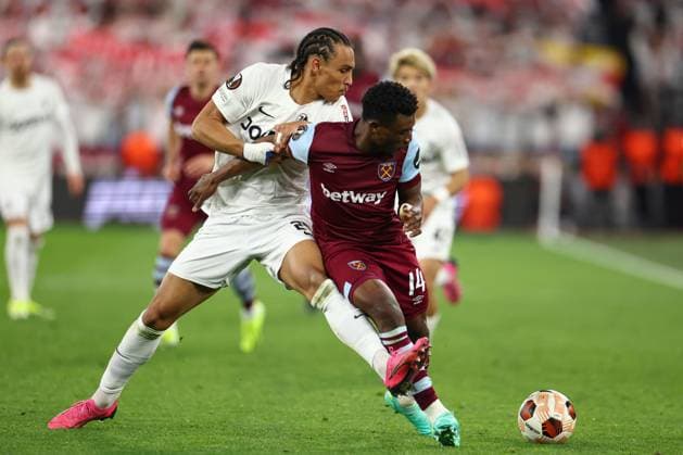 Mohammed Kudus of West Ham United under pressure from Kiliann Sildillia of SC Freiburg West Ham United v Freiburg, UEFA Europa League, Round of 16, Second Leg, Football, London Stadium, London, UK - 14 Mar 2024 EDITORIAL USE ONLY No use with unauthorised audio, video, data, fixture lists, club league logos or live services. Online in-match use limited to 120 images, no video emulation. No use in betting, games or single club league player publications. Copyright: xSimonxDael Shutterstockx 14385551cl