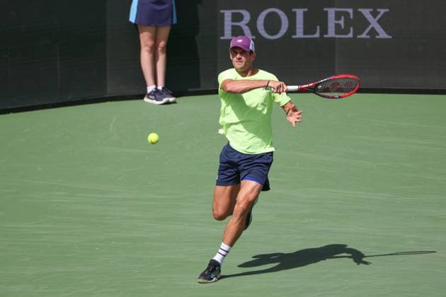 INDIAN WELLS, CA - MARCH 14: Tommy Paul (USA) hits a forehand during the BNP Paribas Open on March 14, 2024 at Indian Wells Tennis Garden in Indian Wells, CA. (Photo by George Walker Icon Sportswire) TENNIS: MAR 14 BNP Paribas Open EDITORIAL USE ONLY Icon240314044